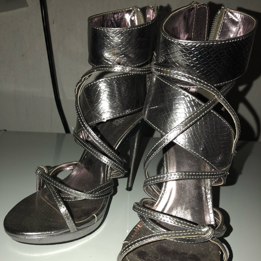 Silver zip up tall heels